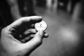 THE COIN TOSS, a poem written by Dilip Mohapatra at Spillwords.com
