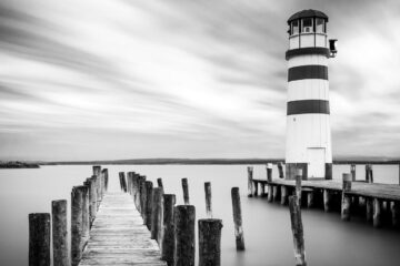 An Old Lighthouse Next to a Lonely Pier and a Cup of Coffee, flash fiction by Marcelo Medone at Spillwords.com