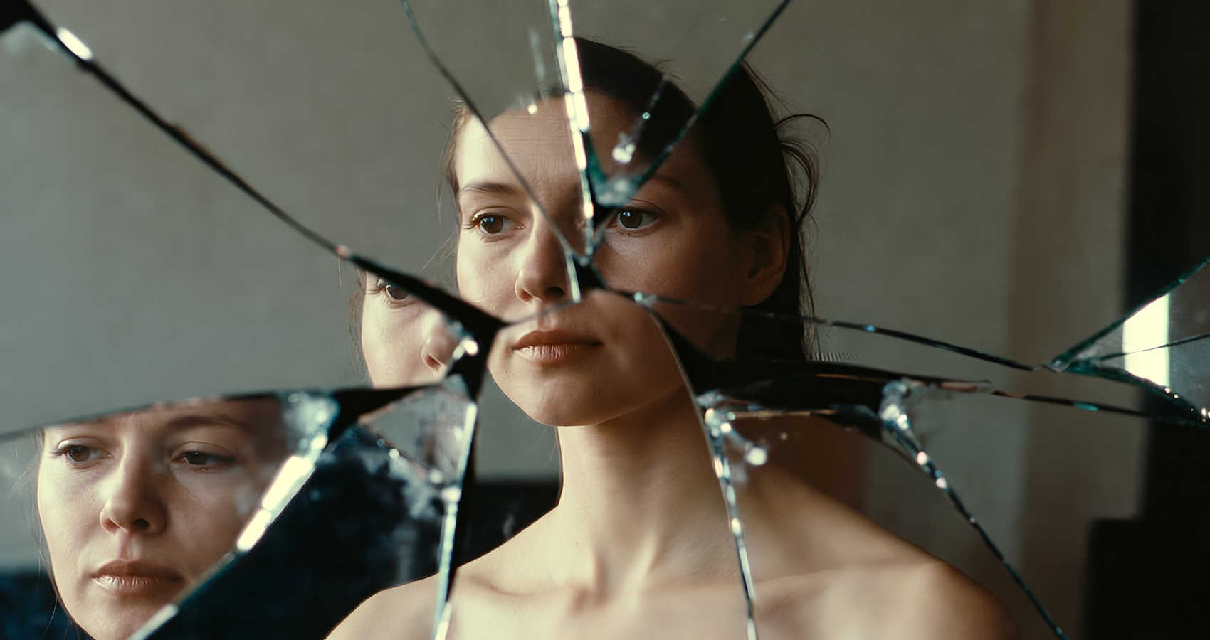 The Mirror Did Not Come as Glass, a poem by Elizabeth Bonsera at Spillwords.com