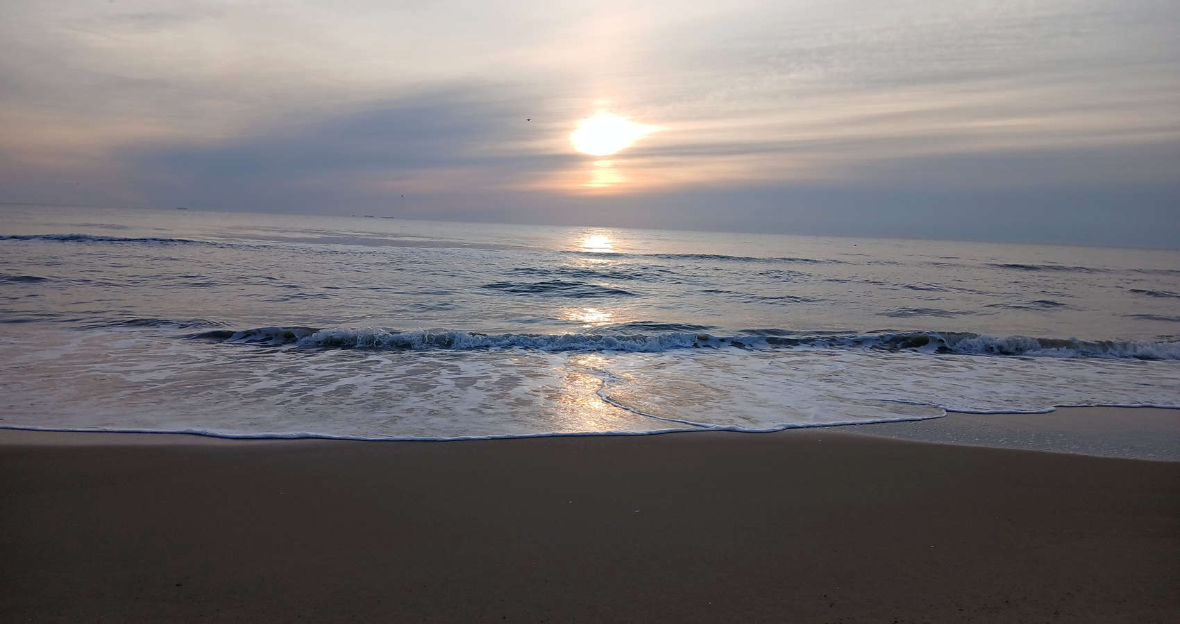 Echoes Off Shore, a poem by Leon Drake at Spillwords.com